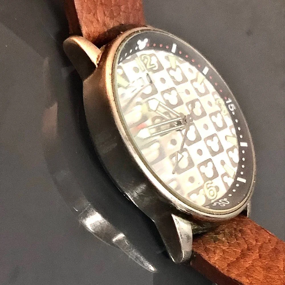Disney Time Works Swing Glowing Date Watch